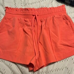 No Boundaries Women's Bright Coral Athletic Shorts